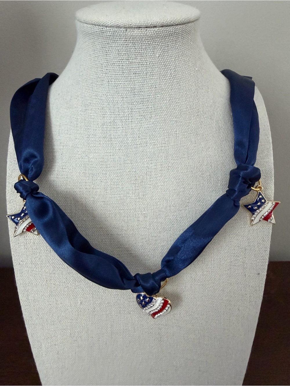 Patriotic charms on a navy scarf necklace